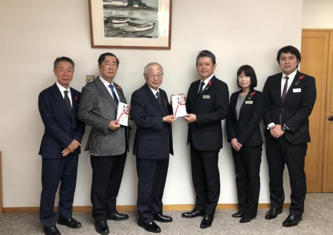 沖銀贈呈式